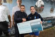 13 November 2010; GAA All Stars Sean Og O hAilpin and Alan Brogan were in parnell Park, Dublin, today as the five finalists of the SureMen challenge go head to head to win €10,000 for their club. The winning football and winning hurling team took €10,000 home to invest in the club. Pictured is Alan Brogan presenting the cheque for the winner of the Football Challenge to Brendan Lennon from Latton O'Rahilly's, Monaghan. For more visit www.suremen.ie. SureMen Challenge Final, Parnell Park, Dublin. Photo by Sportsfile