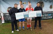 13 November 2010; GAA All Stars Sean Og O hAilpin and Alan Brogan were in parnell Park, Dublin, today as the five finalists of the SureMen challenge go head to head to win €10,000 for their club. The winning football and winning hurling team took €10,000 home to invest in the club. Pictured is Sean Og O hAilpin and Alan Brogan presenting the cheques to the winners of the Hurling and Football Challenges to Hurling winner Vincent Hurley, second from right, from Courcey Rovers, Cork and football winner Brendan Lennon, from Latton O'Rahilly's, Monaghan. For more visit www.suremen.ie. SureMen Challenge Final, Parnell Park, Dublin. Photo by Sportsfile