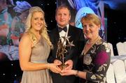 13 November 2010; Brid Stack, from Liscarroll, Co. Cork, with her parents Michael and Elizabeth Stack, and her All Star award at the O'Neills TG4 Ladies Football All-Star Awards 2010, Citywest Hotel, Saggart, Co. Dublin. Picture credit: Brendan Moran / SPORTSFILE