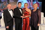 13 November 2010; Yvonne McMonagle, from Glenfin, Co. Donegal, with her parents John, left, and Anne McMonagle, Donegal manager Michael Naughton and her All Star award at the O'Neills TG4 Ladies Football All-Star Awards 2010, Citywest Hotel, Saggart, Co. Dublin. Picture credit: Brendan Moran / SPORTSFILE