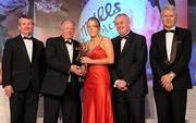 13 November 2010; Cathy Donnelly, Tyrone, is presented with her All Star award by Pat Quill, President, Cumann Peil Gael na mBan, in the company of, from left, Pol O Gallchoir, Ceannsai, TG4, Uachtarán CLG Criostóir Ó Cuana, and Tony Towell, Managing Director, O'Neill's, at the O'Neills TG4 Ladies Football All-Star Awards 2010, Citywest Hotel, Saggart, Co. Dublin. Picture credit: Brendan Moran / SPORTSFILE