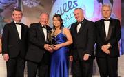13 November 2010; Joline Donnelly, Tyrone, is presented with her All Star award by Pat Quill, President, Cumann Peil Gael na mBan, in the company of, from left, Pol O Gallchoir, Ceannsai, TG4, Uachtarán CLG Criostóir Ó Cuana, and Tony Towell, Managing Director, O'Neill's, at the O'Neills TG4 Ladies Football All-Star Awards 2010, Citywest Hotel, Saggart, Co. Dublin. Picture credit: Brendan Moran / SPORTSFILE