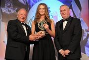 13 November 2010; Sarah McCaffrey, Dublin, is presented with the Leinster Young Player of the Year award by Pat Quill, left, President, Cumann Peil Gael na mBan, and Uachtarán CLG Criostóir Ó Cuana, at the O'Neills TG4 Ladies Football All-Star Awards 2010, Citywest Hotel, Saggart, Co. Dublin. Picture credit: Brendan Moran / SPORTSFILE