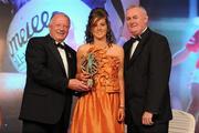 13 November 2010; Kirsty McGuinness, Antrim, is presented with the Ulster Young Player of the Year award by Pat Quill, left, President, Cumann Peil Gael na mBan, and Uachtarán CLG Criostóir Ó Cuana, at the O'Neills TG4 Ladies Football All-Star Awards 2010, Citywest Hotel, Saggart, Co. Dublin. Picture credit: Brendan Moran / SPORTSFILE