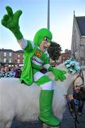 14 November 2010; Shamrock Rovers mascot Hooperman gets a lift on Prince the horse before walking a traditional route from Ringsend to Lansdowne Road before the start of the game. FAI Ford Cup Final, Shamrock Rovers v Sligo Rovers, Aviva Stadium, Lansdowne Road, Dublin. Picture credit: David Maher / SPORTSFILE