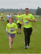 21 August 2016; Jockey Johnny Murtagh and his daughter Grace during The Jog For Jockeys in aid of Irish Injured Jockeys. Over 400 runners took part in the annual Jog For Jockeys 5km and 10km charity runs in aid of Irish Injured Jockeys at the Curragh Racecourse in Kildare today. Photo by Piaras Ó Mídheach/Sportsfile