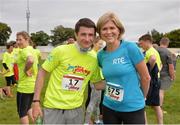 21 August 2016; Shane Foley who came joint-first of jockeys in the 10km race with RTÉ's Anne Cassin at The Jog For Jockeys in aid of Irish Injured Jockeys. Over 400 runners took part in the annual Jog For Jockeys 5km and 10km charity runs in aid of Irish Injured Jockeys at the Curragh Racecourse in Kildare today. Photo by Piaras Ó Mídheach/Sportsfile