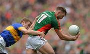 21 August 2016; Aidan O'Shea of Mayo in action against Brian Fox of Tipperary during the GAA Football All-Ireland Senior Championship Semi-Final game between Mayo and Tipperary at Croke Park in Dublin. Photo by Eóin Noonan/Sportsfile