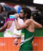 21 August 2016; Mick Clohisey of Ireland rehydrates after finishing the Men's Marathon during the 2016 Rio Summer Olympic Games in Rio de Janeiro, Brazil. Photo by Brendan Moran/Sportsfile