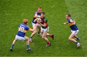 21 August 2016; Séamus O'Shea of Mayo in action against Tipperary's, from left, Josh Keane, George Hannigan and Alan Moloney during the GAA Football All-Ireland Senior Championship Semi-Final game between Mayo and Tipperary at Croke Park in Dublin. Photo by Piaras Ó Mídheach/Sportsfile