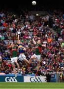 21 August 2016; Michael Quinlivan of Tipperary in action against Patrick Durcan, left, and Donal Vaughan of Mayo during the GAA Football All-Ireland Senior Championship Semi-Final game between Tipperary and Mayo at Croke Park in Dublin. Photo by Ray McManus/Sportsfile