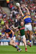 21 August 2016; Alan Moloney of Tipperary and his team mate George Hannigan, left, in action against Donal Vaughan of Mayo during the GAA Football All-Ireland Senior Championship Semi-Final game between Tipperary and Mayo at Croke Park in Dublin. Photo by Ray McManus/Sportsfile