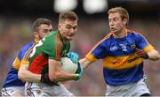 21 August 2016; Conor O'Shea of Mayo in action against Ciarán Kenrick, left and Brian Fox, right of Tipperary during the GAA Football All-Ireland Senior Championship Semi-Final game between Mayo and Tipperary at Croke Park in Dublin. Photo by Eóin Noonan/Sportsfile