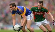 21 August 2016; Conor Sweeney of Tipperary in action against Diarmuid O'Connor of Mayo during the GAA Football All-Ireland Senior Championship Semi-Final game between Mayo and Tipperary at Croke Park in Dublin. Photo by Eóin Noonan/Sportsfile