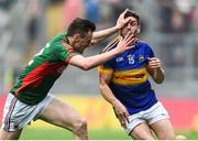 21 August 2016; Philip Austin of Tipperary clashes with Diarmuid O'Connor of Mayo during the GAA Football All-Ireland Senior Championship Semi-Final game between Mayo and Tipperary at Croke Park in Dublin. Photo by David Maher/Sportsfile