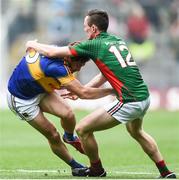 21 August 2016; Philip Austin of Tipperary in action against Diarmuid O'Connor of Mayo during the GAA Football All-Ireland Senior Championship Semi-Final game between Mayo and Tipperary at Croke Park in Dublin. Photo by David Maher/Sportsfile