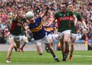 21 August 2016; Jimmy Feehan of Tipperary in action against Colm Boyle, Diarmud O'Connor and Donal Vaughan of Mayo during the GAA Football All-Ireland Senior Championship Semi-Final game between Mayo and Tipperary at Croke Park in Dublin. Photo by David Maher/Sportsfile