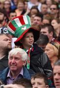 21 August 2016; A young Mayo supporter, in the Cusack Stand, watches the pre match parade before the GAA Football All-Ireland Senior Championship Semi-Final game between Tipperary and Mayo at Croke Park in Dublin. Photo by Ray McManus/Sportsfile