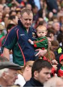 21 August 2016; Morgan Barry and his daughter Saoirse, 9 months, from Ballyhaunis, Co Mayo, arrive in the Cusack Stand for the GAA Football All-Ireland Senior Championship Semi-Final game between Tipperary and Mayo at Croke Park in Dublin. Photo by Ray McManus/Sportsfile