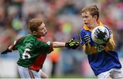 21 August 2016; John Ryan, Scoil Eóin Bosco, Navan road, Dublin representing Tipperary in action against Jamie Kennedy, St Johns N.S., Temple Street, Sligo representing Mayo during the INTO Cumann na mBunscol GAA Respect Exhibition Go GamesGAA Football All-Ireland Senior Championship Semi-Final game between Tipperary and Mayo at Croke Park in Dublin. Photo by Eóin Noonan/Sportsfile