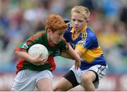 21 August 2016; Bryan O'Connor, St. Michael's and St. Patrick's N.S., Boyle Roscommon representing Mayo in action against Richard Drain, Anahorish primary school Toomebridge, Derry representing Tipperary during the INTO Cumann na mBunscol GAA Respect Exhibition Go GamesGAA Football All-Ireland Senior Championship Semi-Final game between Tipperary and Mayo at Croke Park in Dublin. Photo by Eóin Noonan/Sportsfile