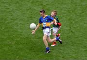 21 August 2016; Gerard Mallie, St Clates Abbey, Newry, Down, representing Tipperary, in action against Jamie Kennedy, St John's NS, Temple Street, Sligo, representing Mayo, during the INTO Cumann na mBunscol GAA Respect Exhibition Go Games during the GAA Football All-Ireland Senior Championship Semi-Final game between Mayo and Tipperary at Croke Park in Dublin. Photo by Piaras Ó Mídheach/Sportsfile