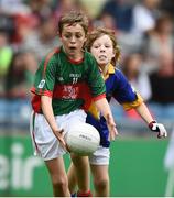 21 August 2016; Mark McDermott, Crubany NS, Cavan, representing Mayo and Blaine Lynch, St. Patrick's P.S. Castlederg, Tyrone representing Tipperary during the INTO Cumann na mBunscol GAA Respect Exhibition Go GamesGAA Football All-Ireland Senior Championship Semi-Final game between Tipperary and Mayo at Croke Park in Dublin. Photo by David Maher/Sportsfile