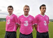 16 November 2010; Republic of Ireland players, left to right, Greg Cunningham, Liam Lawrence and Stephen Kelly, wearing the special one off &quot;Limited Edition&quot; Pink version of the Ireland Home Jersey brought to you by Irish Football Sponsors 3 and Umbro. The jersey features a special embroidery around the FAI crest and a pink ribbon on the sleeve. The Irish Senior International Team sponsored by 3, will support the cause by wearing the kit in the warm-up for Wednesday's International friendly game against Norway at the Aviva Stadium. 10% of the retail value of each jersey will be donated to Action Breast Cancer, a programme of the Irish Cancer Society. The jersey will be available EXCLUSIVELY from FAI partner stores from December 3rd. You can pre-order your kit now on www.faishop.com. 3 Photocall to Launch Umbro Pink Jersey Photocall in aid of Breast Cancer Awareness, Gannon Park, Malahide, Co. Dublin. Picture credit: David Maher / SPORTSFILE