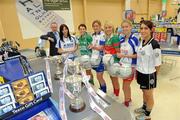 16 November 2010; The captains of the six competing clubs in this year’s Tesco All-Ireland Club Championship finals gathered in Naas in Tesco’s largest store in the country ahead of the finals. Pictured with John Prendergast, Head of Trade Planning and Local Marketing, Tesco Ireland are players, from left, Michelle Downes, West Clare gaels, Co. Clare, Ciara Kilroy, Caltra Cuans, Co. Galway, Claire O'Connell, St. Conleth's, Co. laois, Aoife Loftus, Carnacon, Co. Mayo, Jenny Duffy, Inch Rovers, Co. Cork, and Emma Nugent, St. Enda's Co. Tyrone. Tesco All-Ireland Ladies Football Club Championship Finals Captains Day, Tesco, Monread Road, Naas, Co. Kildare. Photo by Sportsfile