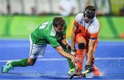 7 August 2016; John Jermyn of Ireland in action against Sander de Wijn of Netherlands during their Pool B match at the Olympic Hockey Centre, Deodoro, during the 2016 Rio Summer Olympic Games in Rio de Janeiro, Brazil. Picture by Brendan Moran/Sportsfile