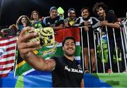 11 August 2016; Akira Ioane of New Zealand takes a picture with supporters following the Men's Rugby Sevens placing 5-6 match between New Zealand and Argentina during the 2016 Rio Summer Olympic Games at Deodoro Stadium in Rio de Janeiro, Brazil. Photo by Stephen McCarthy/Sportsfile