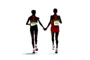 14 August 2016; Women's marathon winner Jemima Jelagat Sumgong of Kenya, left, and second place Eunice Jepkirui Kirwa of Bahrain following the Women's Marathon during the 2016 Rio Summer Olympic Games in Rio de Janeiro, Brazil. Photo by Stephen McCarthy/Sportsfile