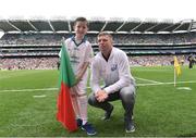 21 August 2016; eir Flagbearer Joshua Cosgrove, age 10, from Bellmullet, Co Mayo, with eir GAA ambassador Tomás Ó Sé at the All-Ireland Senior Championship Semi-Final game between Mayo and Tipperary at Croke Park in Dublin. Photo by David Maher/Sportsfile