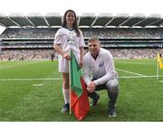 21 August 2016; eir Flagbearer Tanya Cunningham, age 12, from Castlebar, Co. Mayo, with eir GAA ambassador Tomás Ó Sé at the All-Ireland Senior Championship Semi-Final game between Mayo and Tipperary at Croke Park in Dublin. Photo by David Maher/Sportsfile