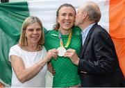 23 August 2016; Annalise Murphy, centre, of Ireland, who won a silver medal in the Women's Laser Radial Medal race at the 2016 Rio Summer Olympic Games in Rio de Janeiro, with her parents Cathy and Con Murphy after a press conference on her return at Dublin Airport, Dublin. Photo by Seb Daly/Sportsfile