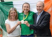 23 August 2016; Annalise Murphy, centre, of Ireland, who won a silver medal in the Women's Laser Radial Medal race at the 2016 Rio Summer Olympic Games in Rio de Janeiro, with her parents Cathy and Con Murphy after a press conference on her return at Dublin Airport, Dublin. Photo by Seb Daly/Sportsfile