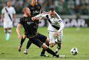 23 August 2016; Michal Kucharczyk of Legia Warsaw in action against Chris Shields of Dundalk FC during the UEFA Champions League Play Off 2nd Leg match between Legia Warsaw and Dundalk FC at the Stadion Miejski in Warsaw, Poland. Photo by Piotr Kucza/Sportsfile