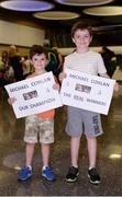 24 August 2016; Jarard Roche, left, age 5, and brother Robert, age 7, hold homemade posters as they wait for Irish boxer Michael Conlan at Dublin Airport as Team Ireland arrive home from the  Rio 2016 Olympic Games at Dublin Airport in Dublin. Photo by Seb Daly/Sportsfile