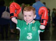 24 August 2016; Joel Thomas, age 5, from Baldoyle, Co. Dublin, waits for the Irish boxers at Dublin Airport as Team Ireland arrive home from the Rio 2016 Olympic Games at Dublin Airport in Dublin. Photo by Seb Daly/Sportsfile