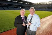 17 November 2010; Uachtarán CLG Criostóir Ó Cuana offers his congratulations to Croke Park Head Steward Bill Barry on winning the Sports and Leisure section in the 2010 Ireland Involved Awards. Croke Park, Dublin. Picture credit: Brendan Moran / SPORTSFILE