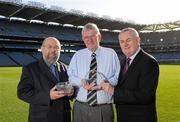 17 November 2010; Uachtarán CLG Criostóir Ó Cuana, right, offers his congratulations to Croke Park Head Steward Bill Barry, centre, who was overall winner in the Sport and Leisure Section of the 2010 Ireland and Involved Awards ANS Seamus O Midheach who was presented with 2010 Ireland Involved Award on behalf of the Stadium for their excxellence in volunteerism. Croke Park, Dublin. Picture credit: Brendan Moran / SPORTSFILE