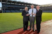17 November 2010; Uachtarán CLG Criostóir Ó Cuana, right, offers his congratulations to Croke Park Head Steward Bill Barry, centre, who was overall winner in the Sport and Leisure Section of the 2010 Ireland and Involved Awards ANS Seamus O Midheach who was presented with 2010 Ireland Involved Award on behalf of the Stadium for their excxellence in volunteerism. Croke Park, Dublin. Picture credit: Brendan Moran / SPORTSFILE