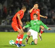 17 November 2010; Pat McCourt, Northern Ireland, in action against Rachid  oulaimani, Morocco. International Friendly, Northern Ireland v Morocco, Windsor Park, Belfast, Co. Antrim. Picture credit: Oliver McVeigh / SPORTSFILE
