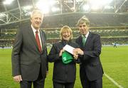 17 November 2010; When Brigid Schlebaum, from Fairview, Dublin, walked through the turnstile at Aviva Stadium for the Ireland v Norway international she became the 500,000th fan to visit the stadium since its opening for the Combined Provinces Rugby game on July 31st. To mark the occasion the stadium presented her with 2 tickets to the Carling Four Nations Cup in February, she will also receive Dinner for two and a nights accomdadation in the Louis Fitzgerald hotel. Our picture shows Brigid being presented with her prize by CEO of the FAI John Delaney, right, and Stadium director Martin Murphy. Since then the stadium has played host to international soccer games with Argentina, Andorra, Russia and Norway, a visit by Manchester Utd and the FAI Ford Cup Final. It has also hosted Leinster v Munster in the Magners League and rugby internationals with the All Blacks and Samoa. In addition singer Michael Buble has performed two sell-out concerts. Aviva Stadium, Lansdowne Road, Dublin. Picture credit: Brian Lawless / SPORTSFILE