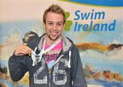 18 November 2010; William Ensor celebrates with his medal after winning the Mens 50m backstroke final. Irish National Short Course Swimming Championships - Thursday 18th November, Leisureland, Salthill, Co. Galway. Picture credit: Diarmuid Greene / SPORTSFILE