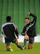 19 November 2010; New Zealand's Jerome Kaino and Dan Carter, left, in action during the captain's run ahead of their Autumn International against Ireland on Saturday. New Zealand Rugby Squad Capatain's Run, Aviva Stadium, Landsdowne Road, Dublin. Picture credit: Alan Place / SPORTSFILE