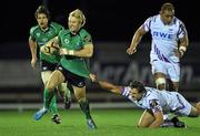 19 November 2010; Fionn Carr, Connacht, is tackled by Ashley Beck, Ospreys. Celtic League, Connacht v Ospreys, Sportsground, Galway. Picture credit: David Maher / SPORTSFILE