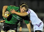 19 November 2010; Michael Swift, Connacht, is tackled by Sonny Parker, Ospreys. Celtic League, Connacht v Ospreys, Sportsground, Galway. Picture credit: David Maher / SPORTSFILE