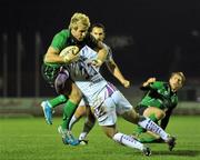 19 November 2010; Fionn Carr, Connacht, is tackled by Richard Fussell, Ospreys. Celtic League, Connacht v Ospreys, Sportsground, Galway. Picture credit: David Maher / SPORTSFILE