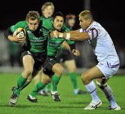 19 November 2010; Gavin Duffy, Connacht, in action against Jerry Collins, Ospreys. Celtic League, Connacht v Ospreys, Sportsground, Galway. Picture credit: David Maher / SPORTSFILE